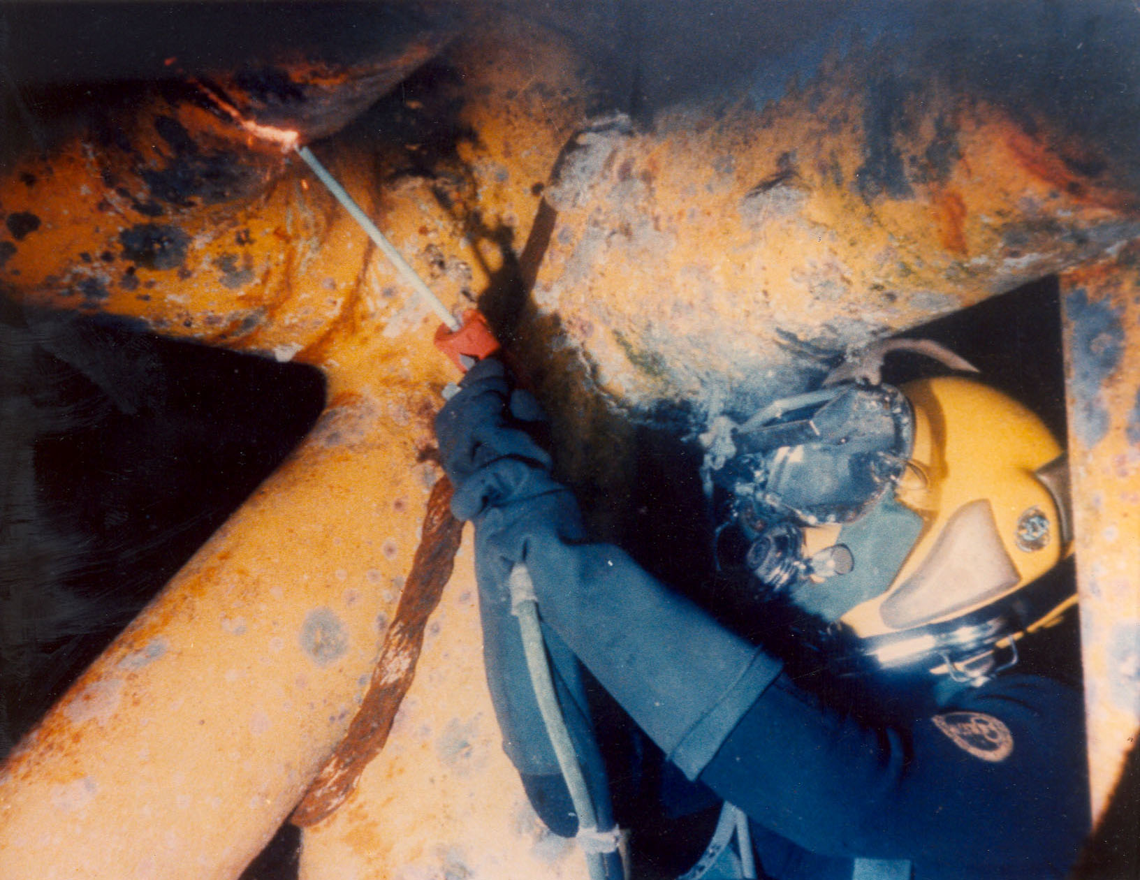 Diver installing anodes